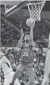  ?? THE ASSOCIATED PRESS ?? Duke’s Marvin Bagley III (35) gets past a Portland State defender for two of his 18 points Thursday.