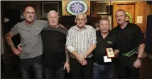  ??  ?? Wicklow Division 2 Darts League winners, Gallery B: Ned Kealy, Pat Molloy, John Sunderland and Heinz Werder with pro Mick McGowan.