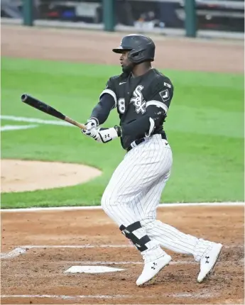  ?? JONATHAN DANIEL/GETTY IMAGES ?? Rookie Luis Robert gets his first major-league hit, a single in the second inning Friday.