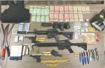  ?? ST. THOMAS POLICE SERVICE ?? Kyle Moir and Hannah Williamson face a combined 76 charges after police in
St. Thomas seized weapons, drugs and cash during a raid on Thursday.