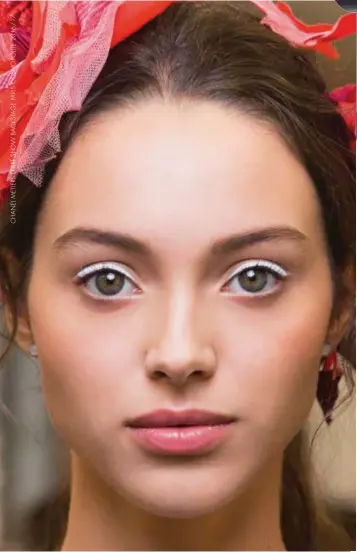  ??  ?? MODELS EYES WERE WIDE OPEN WITH A HEALTHY SLICK OF BRIGHTER THAN WHITE EYELINER AT THE CHANEL SHOW