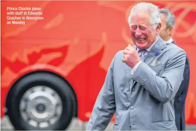  ??  ?? Prince Charles jokes with staff at Edwards Coaches in Abercynon on Monday