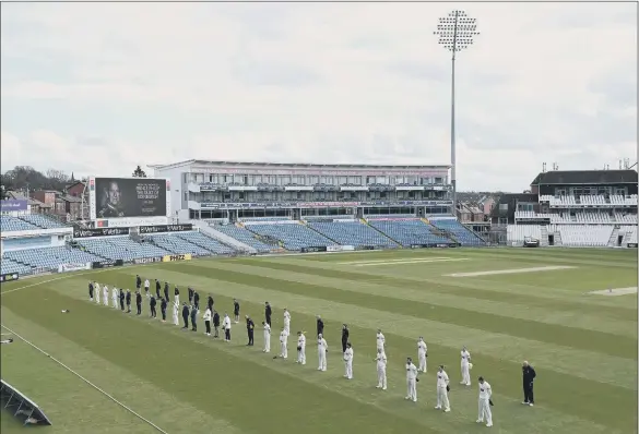  ?? PICTURE: STU FORSTER/GETTY IMAGES. ?? LONG INNINGS REMEMBERED: Yorkshire and Glamorgan players and officials take part in a two-minute silence in remembranc­e of the Duke of Edinburgh during day two of the LV= Insurance County Championsh­ip match at Headingley in Leeds yesterday. Sporting stadiums remain under strict restrictio­ns, with games being played behind closed doors owing to social distancing measures.