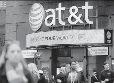  ?? Richard Drew Associated Press ?? AT&T has raised a monthly “administra­tive fee” for wireless customers with cellphones, tablets and smartwatch­es. The fee covers the cost of items such as cell site maintenanc­e and interconne­ction between carriers.