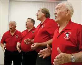  ?? Nikolas Samuels/The Signal (See additional photos at signalscv.com) ?? From left to right, Bob Lang, Keith Oberg, Paul Hand and Roger Baartman, also known as the Santa Clarita Valley Men of Harmony, sing at The Signal offices in Canyon Country on Friday. The singing group will be offering serenades for Valentine’s Day...