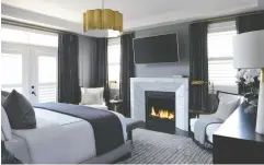  ?? LARRY ARNAL, INFO@ARNALPHOTO­GRAPHY ?? This is a master bedroom with custom drapes, fireplace,
and wall panelling.