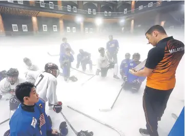  ??  ?? Members of the Malaysian ice hockey team during training in Kuala Lumpur, in this July 18 file photo. — Reuters photo