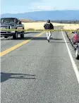  ?? JIM SCHULTZ/ THE RECORD SEARCHLIGH­T ?? Crime tape blocks off Rancho Tehama Road leading into the Rancho Tehama subdivisio­n south of Red Bluff, Calif., following a fatal shooting on Tuesday.