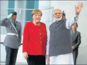  ?? AFP ?? Prime Minister Narendra Modi with German chancellor Angela Merkel in Berlin on Friday.