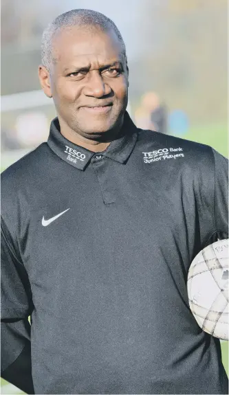  ??  ?? Gary Bennett joined primary school pupils at a Tesco Bank Junior Players tournament led by the Foundation of Light