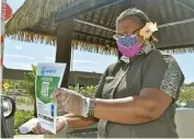  ?? ?? Fiji Marriott Resort Momi Bay staff welcoming local tourists while adhering to the COVID-19 safe protocols.