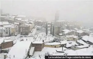  ?? RAMON MESALLES ?? La localidad de Fraga cubierta de nieve.