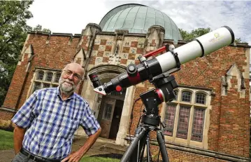  ?? BILL LACKEY / STAFF ?? Dan Fleisch, Wittenberg University’s professor emeritus of physics, is pictured in front of the university’s Weaver Observator­y in August 2023.