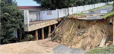  ?? Pictures: Sakhiseni Nxumalo ?? A section of Chartwell Drive, Umhlanga, was washed away in the floods this month.