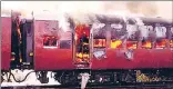  ?? REUTERS FILE ?? A coach of a train, carrying Hindu pilgrims, burns in Gujarat’s Godhra.