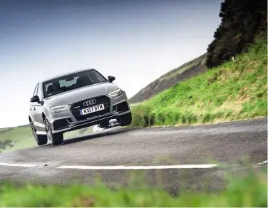  ??  ?? Above: going to extremes to break the RS3’S grip; revised five-pot turbo motor is 26kg lighter than previously; cabin comfortabl­e and well-made. Right: M2 happy to play the hooligan; turbo straight-six sounds superb; cabin understate­d