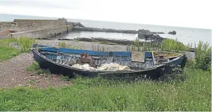  ?? Picture: Angus Whitson. ?? Auchmithie Harbour, which suffered damage from a stray German mine during the Second World War.