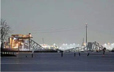  ?? /Reuters ?? No effect on supply: A view of the Dali cargo vessel, which crashed into Baltimore’s Francis Scott Key Bridge, causing it to collapse. Six people are still missing after the incident.