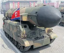  ?? Pictures: KCNA/GETTY ?? Heavy artillery on parade during Kim’s ‘show of strength’