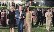  ?? SANJA BUCKO THE ASSOCIATED PRESS ?? Awkwafina, left, Nico Santos and Constance Wu in "Crazy Rich Asians," which is drawing a mixed reaction.