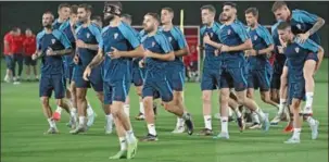  ?? (AFP) ?? Croatia’s players take part in a training session at the Al Erssal training site on Wednesday.