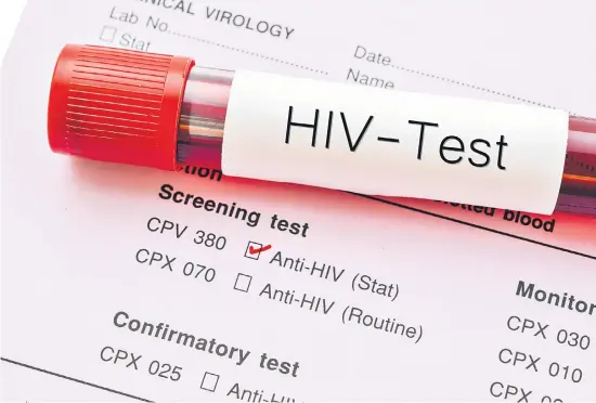  ??  ?? THE LOW-DOWN. Blood sample collection tube with HIV test label on HIV infection screening test form.