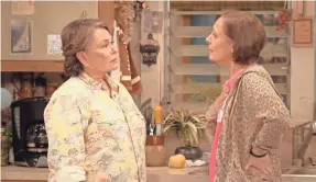  ?? ABC ?? Roseanne and sister Jackie (Laurie Metcalf) still butt heads on politics.