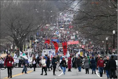  ?? (AP/Susan Walsh) ?? Marchers opposed to abortion fill the streets Friday in Washington as President Donald Trump’s campaign center announced a new coalition, “Pro-life Voices for Trump.”