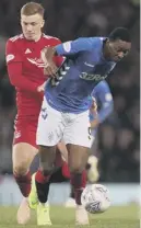  ??  ?? 0 Lewis Ferguson battles Rangers’ Umar Sadiq in the semi-final win.