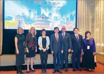  ?? PHOTOS BY ZHANG RUINAN / CHINA DAILY ?? Wang Xiaofeng, vice-chairman of China National Tourism Administra­tion (center), and Zhang Qiyue (third from left), China’s consul general in New York, attend the Beautiful China-World Heritage Tourism promotion event hosted by the CNTA on Thursday in...