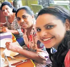  ??  ?? MOMENTS TO LIVE: This photo of chef Shantha Mayadunne (far left) and daughter Nisanga Mayadunne (right) dining at the Shangri-La hotel was posted just before they were killed in a bombing there.