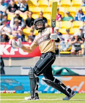  ?? Photo / Photosport ?? Martin Guptill watches one whistle high over the boundary.