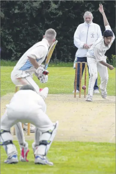  ?? Picture: Paul Amos FM3353799 ?? Ashford Town bowler Mo Raza fires down a delivery against Rodmersham