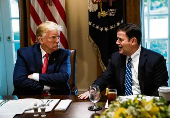  ?? JABIN BOTSFORD/WASHINGTON POST/FILE ?? Donald Trump, with then-Arizona Governor Doug Ducey in 2019, attacked Ducey after the governor certified Joe Biden’s win.