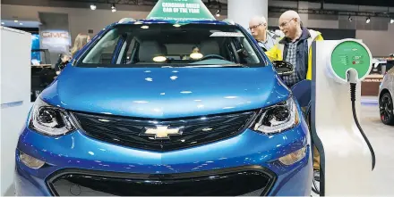  ?? RICHARD LAM/PNG ?? The electric Chevy Bolt on display at the 2018 Vancouver Internatio­nal Auto Show.