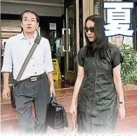  ??  ?? 北京知名維權律師、曾為聲援香港佔中而被­捕的郭玉閃辯護的夏霖（左），被指涉嫌詐騙罪，遭重判入獄12年。右夏霖妻子林茹。（美聯社檔案照片）