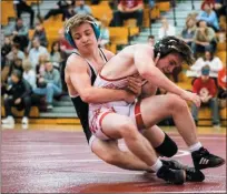  ?? JAMES BEAVER — FOR MEDIANEWS GROUP ?? Pennridge’s Andrew Minko pulls Souderton’s Dylan Heathcote to the mat in their 132 pound match Wednesday.