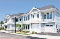  ??  ?? Homes at On the Sound — City Island’s first new developmen­t in more than a decade. Prices here begin at $770,000.