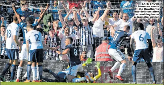  ?? Picture: STU FORSTER ?? LATE SHOW: Livermore sends the Hawthorns into delirium after scrambling home a dramatic winner