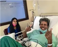  ??  ?? PATH TO RECOVERY: Kapil Dev seen in a cheerful mood after his angioplast­y. — Twitter