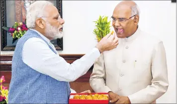  ?? PTI ?? Prime Minister Narendra Modi with President-elect Ram Nath Kovind in New Delhi on Thursday.