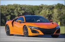  ??  ?? The 2019 Acura NSX’s launch control flings the car from 0 to 60 mph in 2.7-sec.