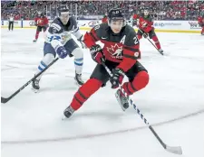  ?? MARK BLINCH/THE CANADIAN PRESS ?? Canada’s Victor Mete skates against Finland’s Janne Kuokkanen during the second period of IIHF World Junior Championsh­ip preliminar­y round hockey action, in Buffalo, on Tuesday Dec. 26.