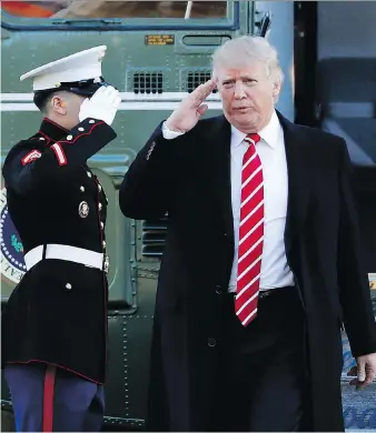  ?? MANUEL BALCE CENETA/THE ASSOCIATED PRESS ?? President Donald Trump salutes a Marines honour guard as he disembarks from Marine One upon arrival at the White House in Washington, D.C., following a trip to Florida.