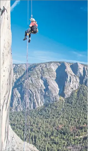  ?? ?? Karen Darke, left, scales the mighty rock-face of El Capitan which towers 3,600ft over the western end of Yosemite Valley in California in 2008