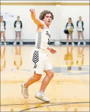  ?? OKLAHOMAN] ?? Heritage Hall's Jack Spanier reacts after a basket during a 53-45 win Friday against Carl Albert. [SARAH PHIPPS/ THE