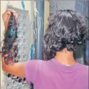  ?? HT FILE ?? (left) The most celebrated of mass hysterias was when idols of Ganesha were said to be drinking milk in the 1990s, prompting devotees to throng temples across the country; a girl shows her braid, which was ‘mysterious­ly’ cut off, in what is the latest...