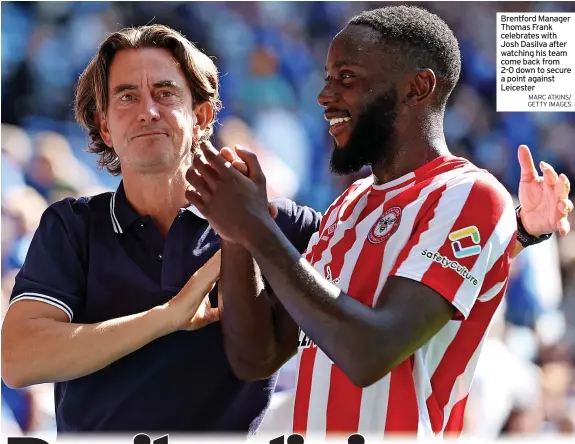  ?? MARC ATKINS/ GETTY IMAGES ?? Brentford Manager Thomas Frank celebrates with Josh Dasilva after watching his team come back from 2-0 down to secure a point against Leicester