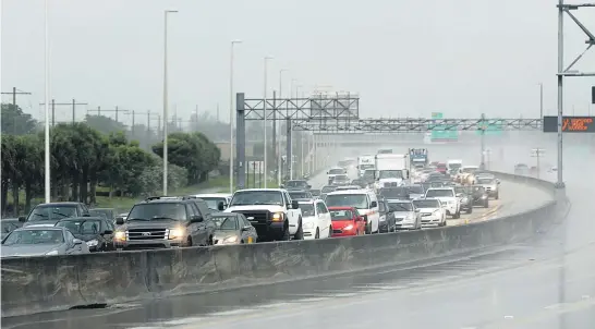  ?? Pictures / AP ?? Traffic through Sunrise, Florida, was limping along as thousands made their way north in an effort to avoid Hurricane Irma.