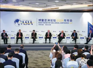  ?? FENG YONGBIN / CHINA DAILY ?? Participan­ts discuss the outlook for the Chinese economy during the Boao Forum for Asia Annual Conference 2024 in Boao, Hainan province, on Thursday.